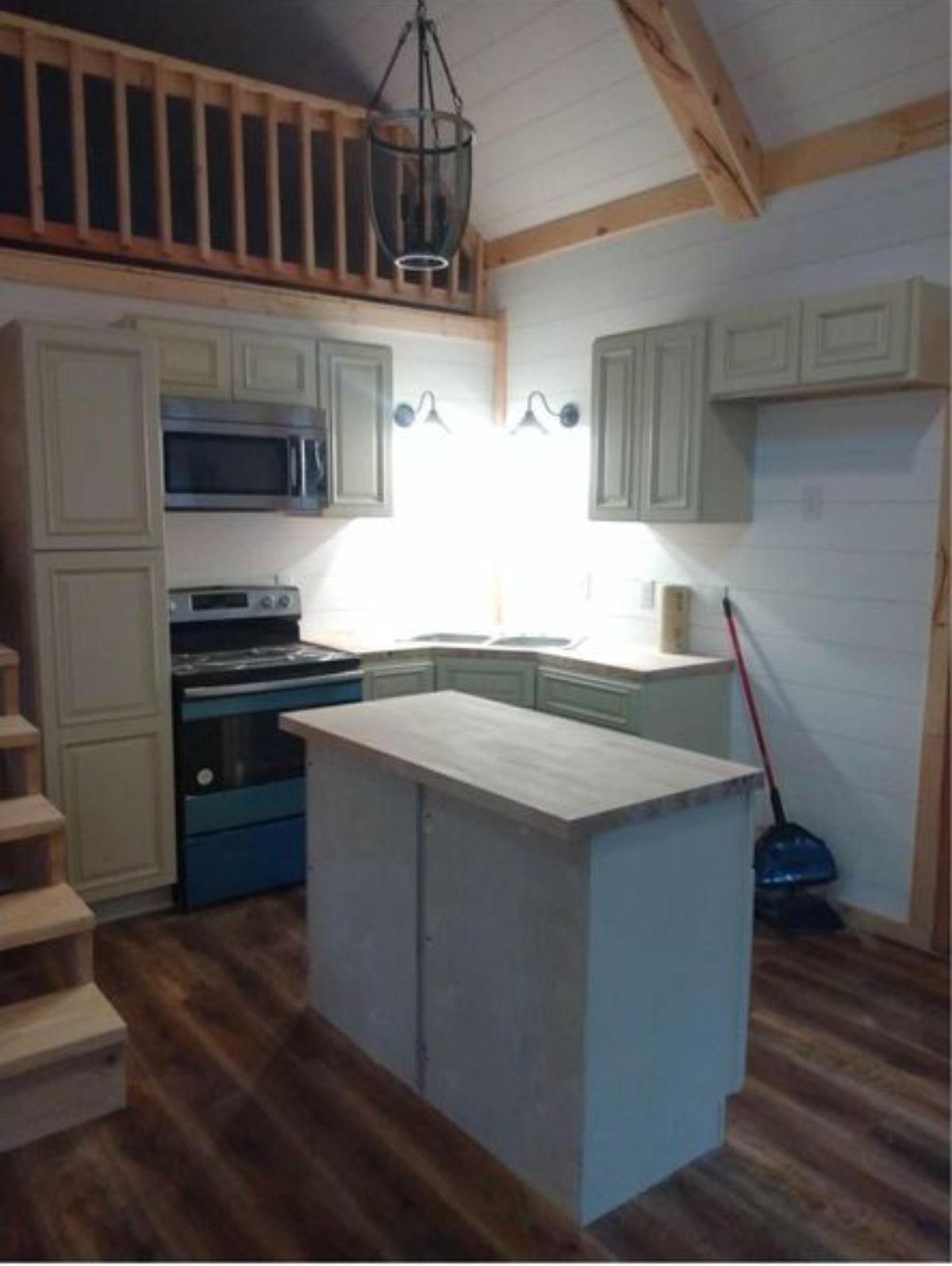 kitchen area of two story cabin home