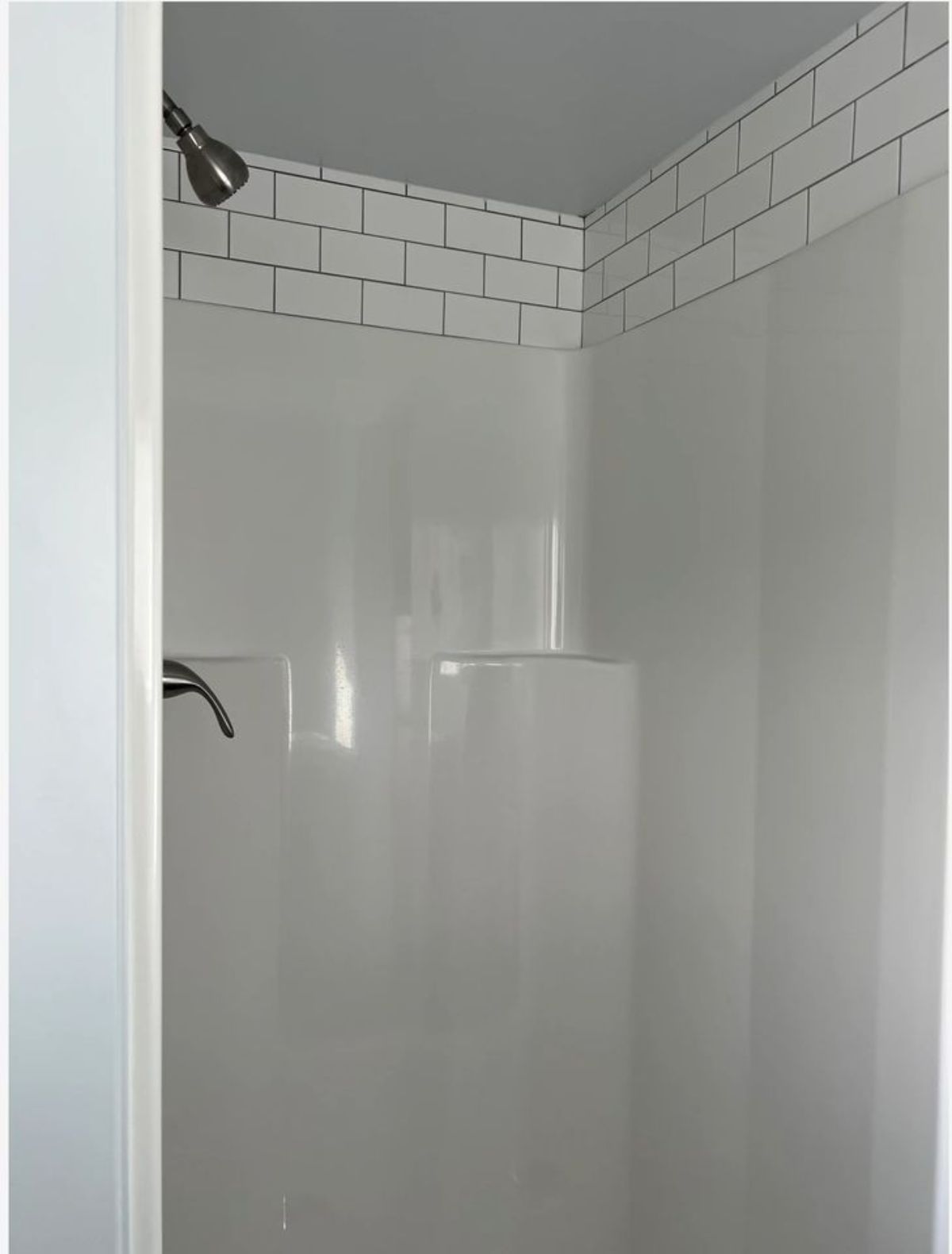 separate shower area in bathroom of 20’ modern tiny home