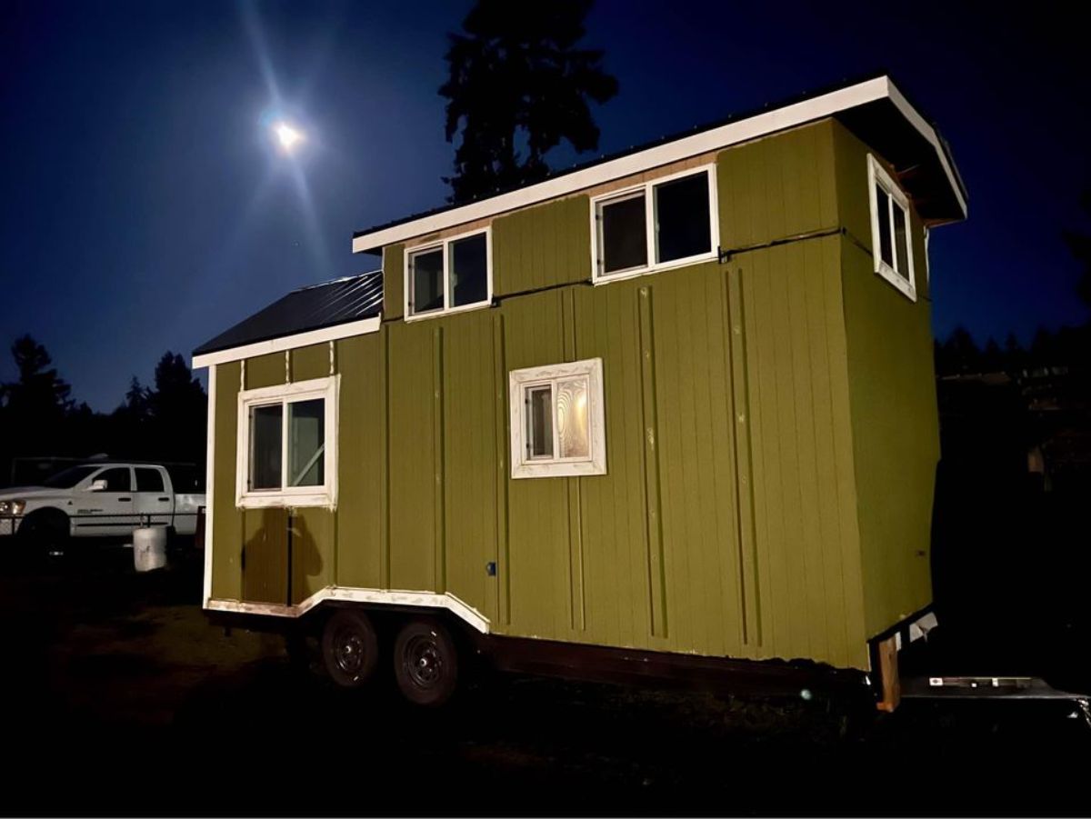 stunning olive green exterior of 20’ tiny house
