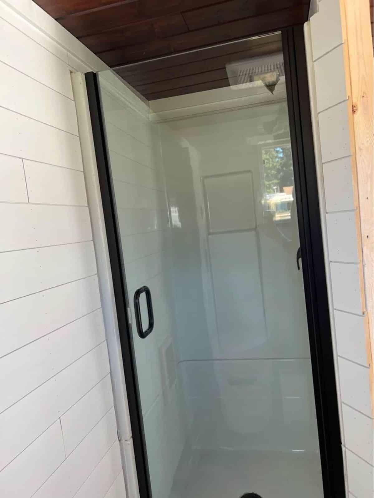 separate shower area with glass enclosure