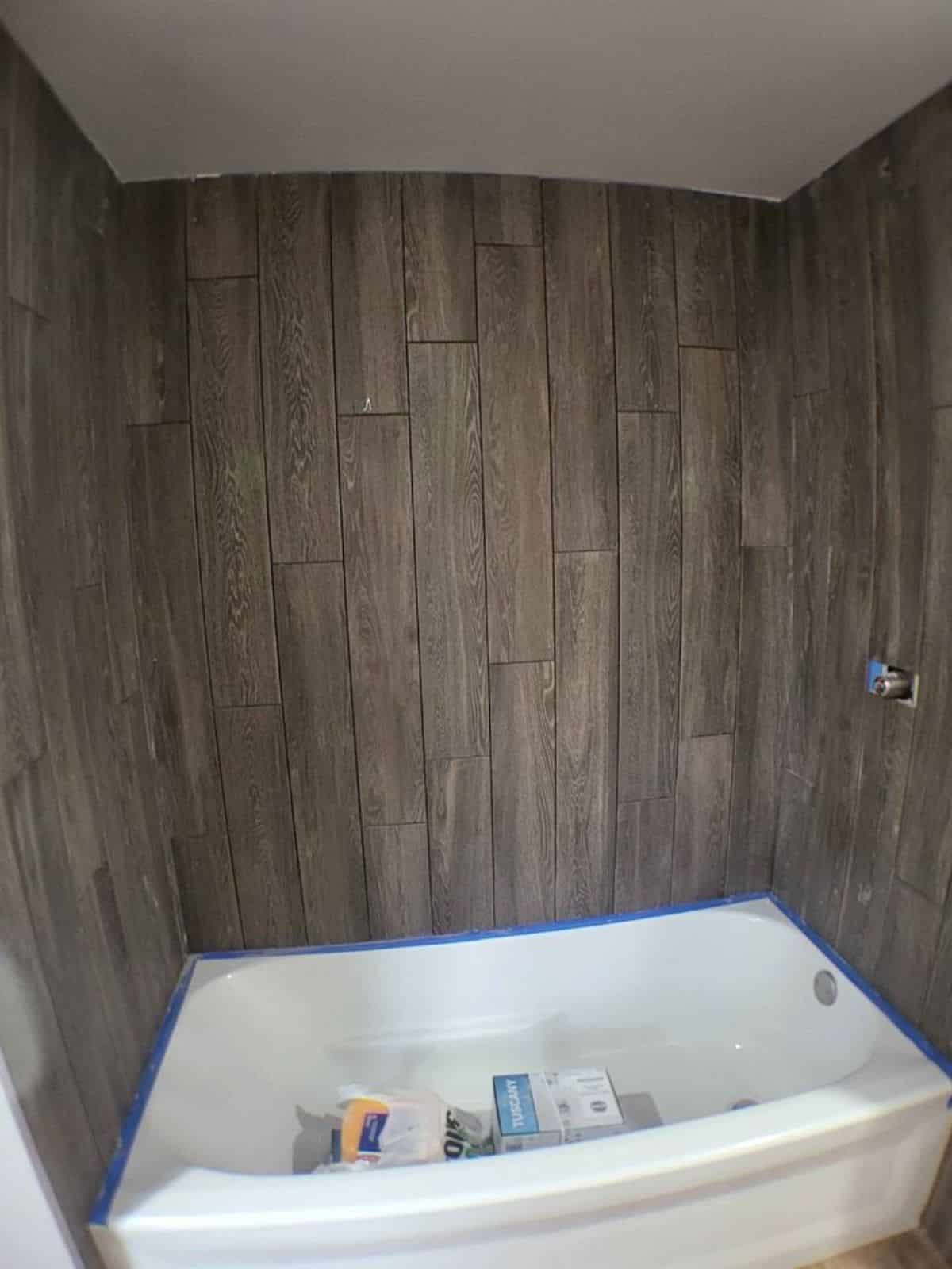 bathtub for shower included in the bathroom