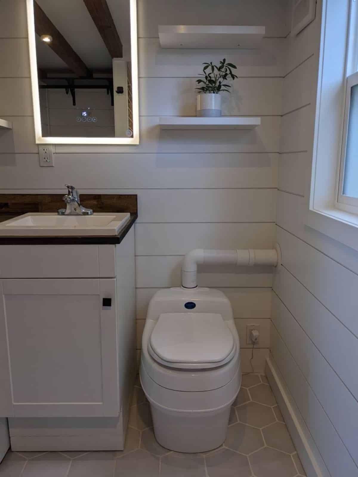 composting toilet in bathroom of 24’ tiny house in Canada