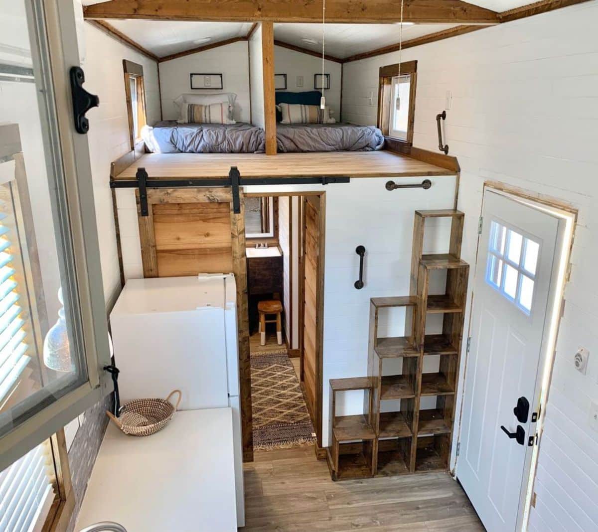 2 huge loft bedrooms 1 above the bathroom and 1 above the living area, both converted into 4 equal parts
