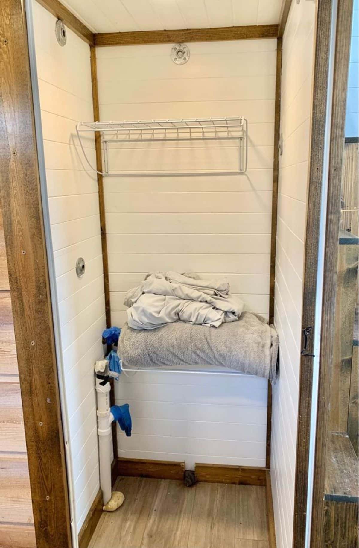 separate space for washer dryer combo in bathroom