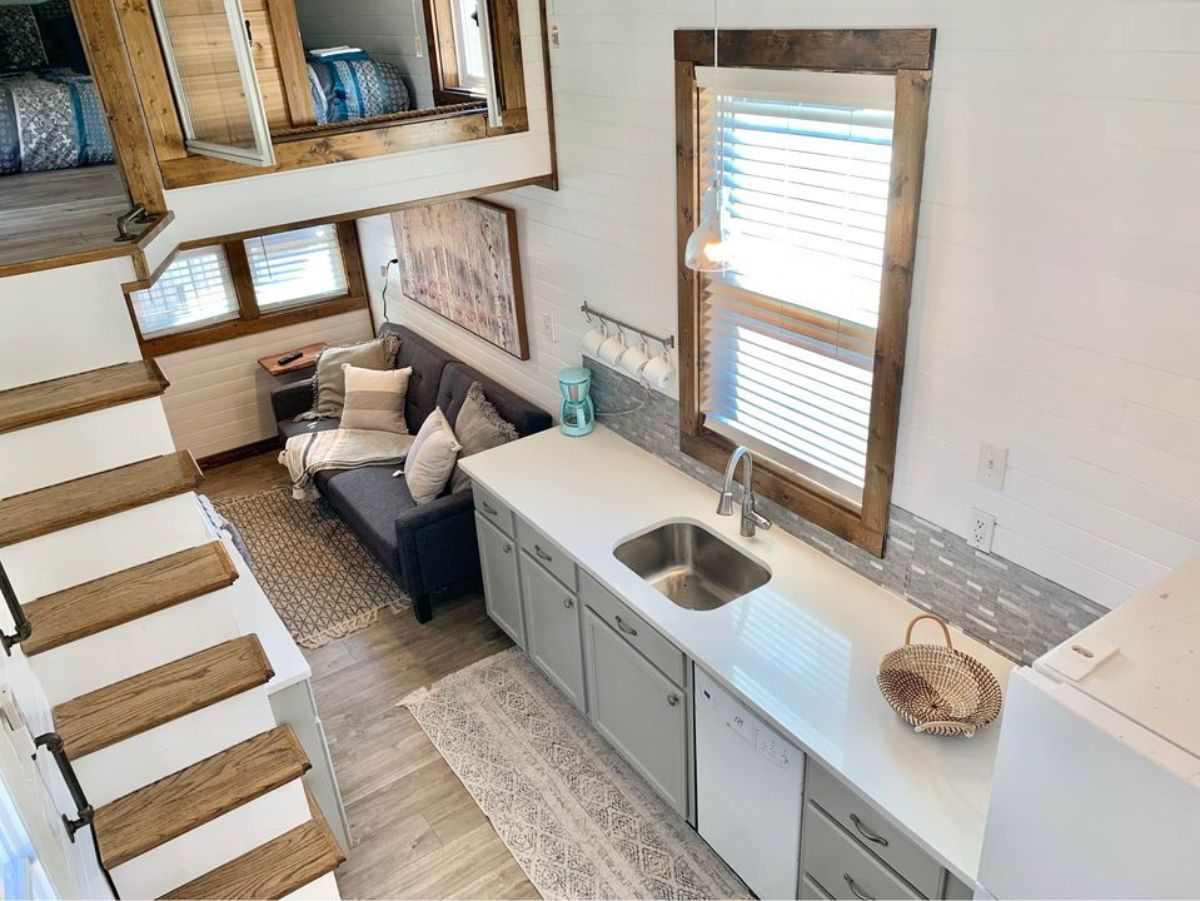 wooden interiors and huge loft above the living area of 28’ NOAH certified tiny home