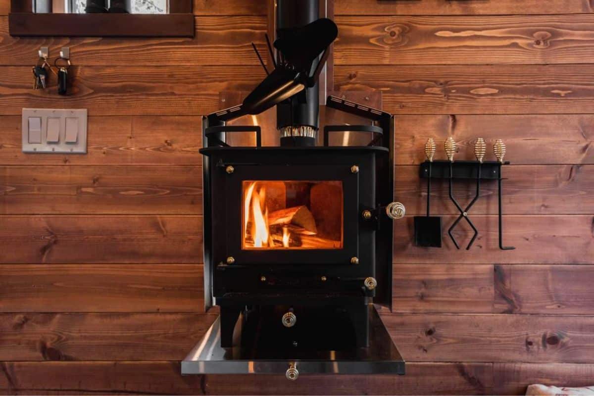 real wood burning stove in living area to keep the house warm during winters
