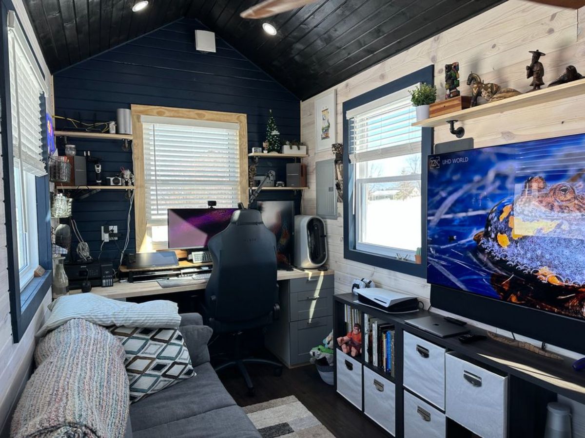 work desk space besides living area of 32' fully furnished tiny home