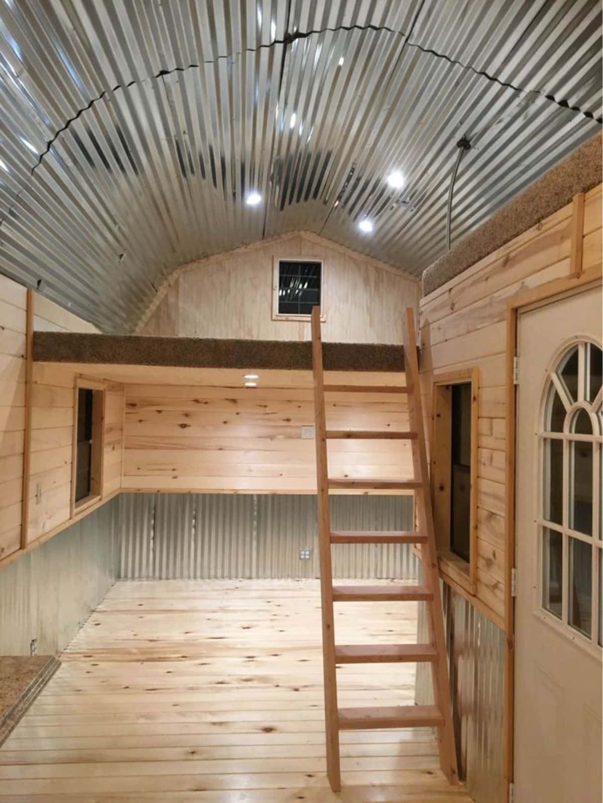 loft 1 is above the living area of $55k double lofted tiny home
