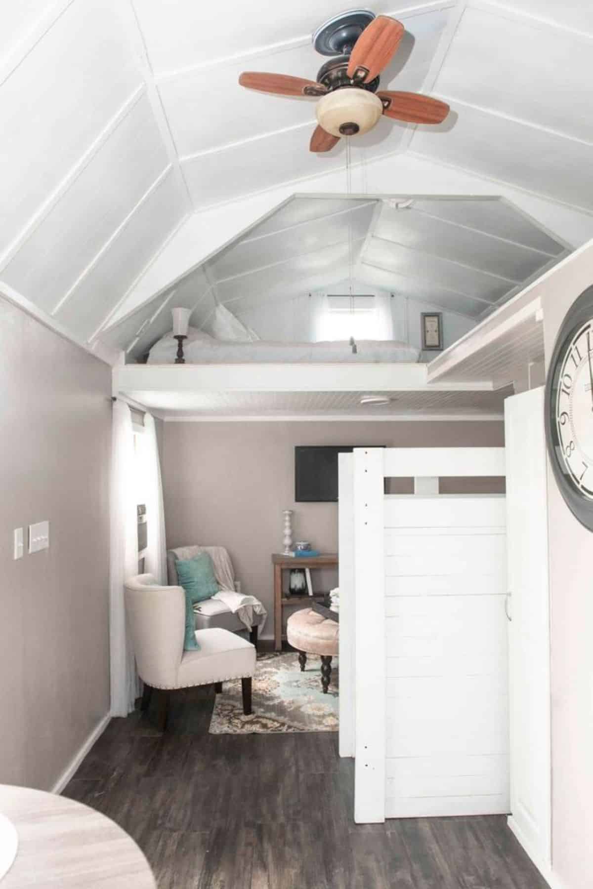 full length white interior of adorable tiny home