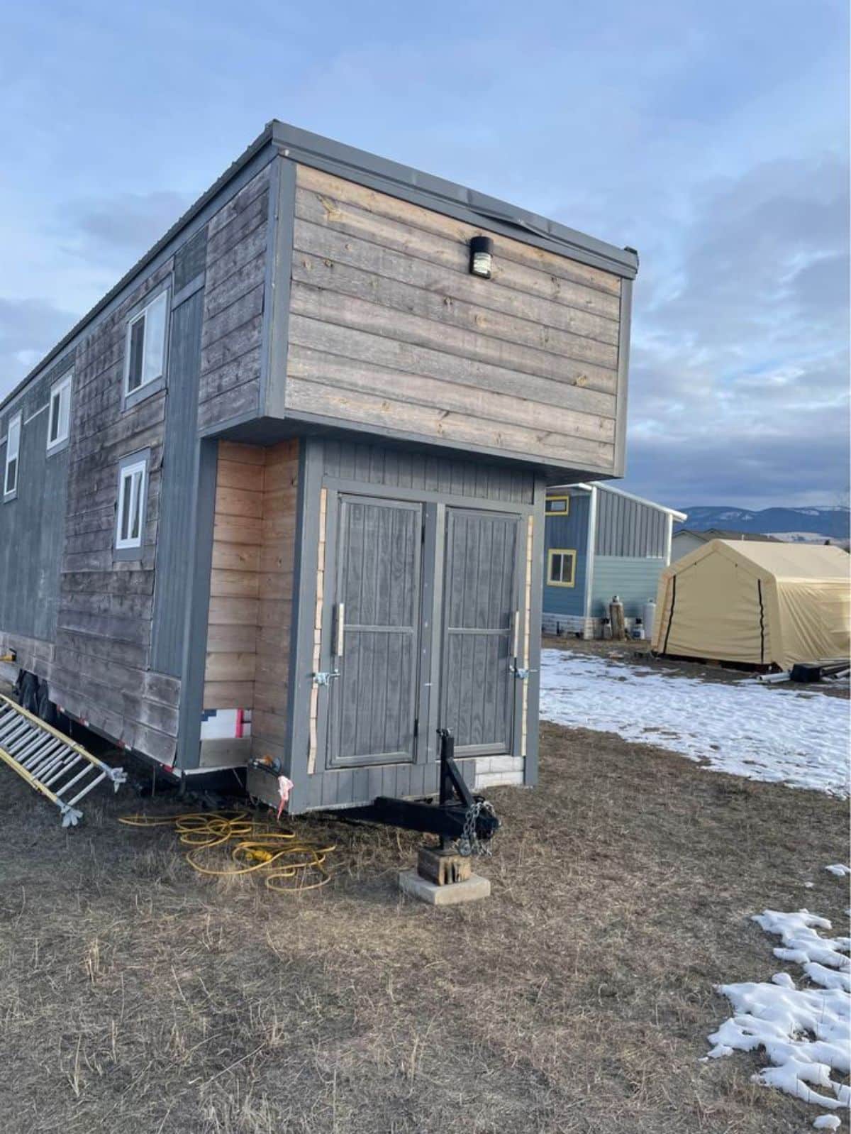 side view of affordable tiny home on wheels
