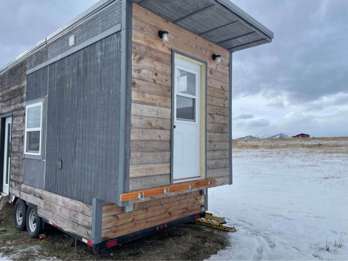 side door view of affordable tiny home on wheels