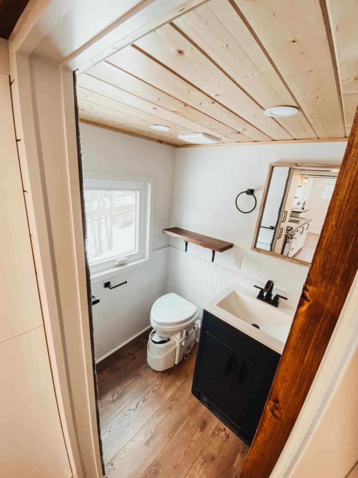 composting toilet in bathroom of 28’ tiny home in Canada