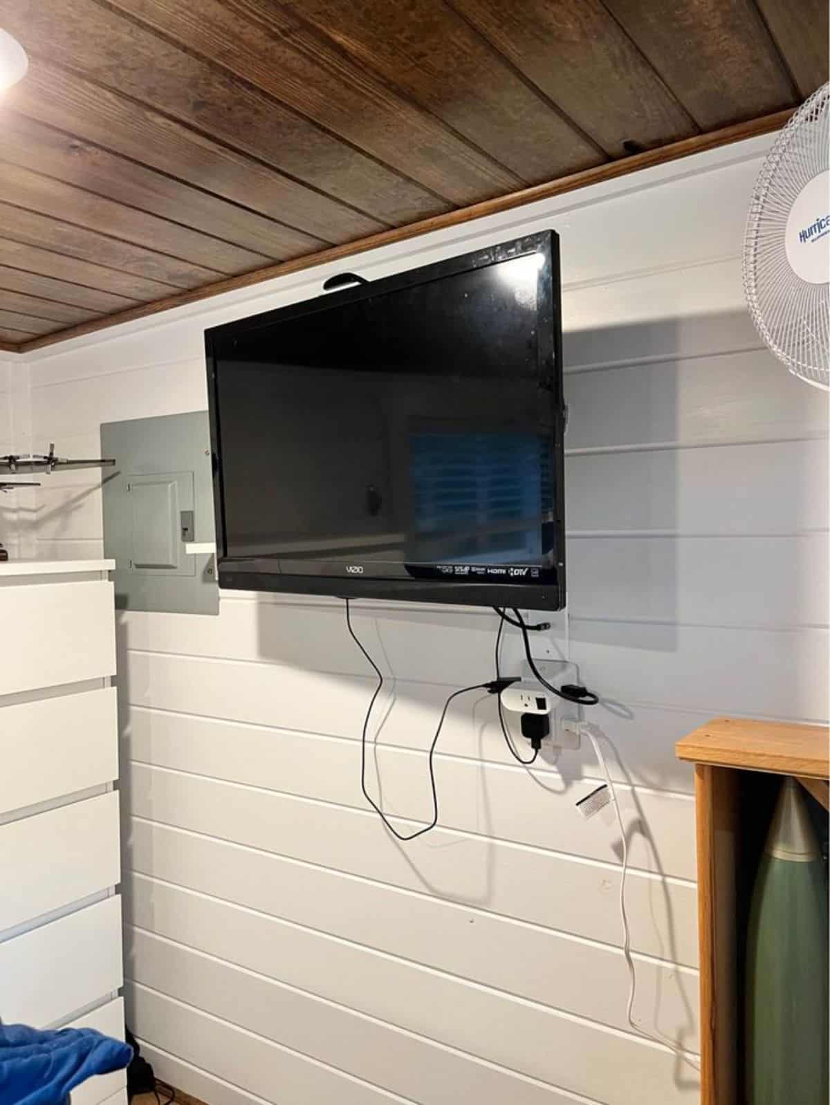 wall mounted TV set installed on the loft of 30’ tiny house