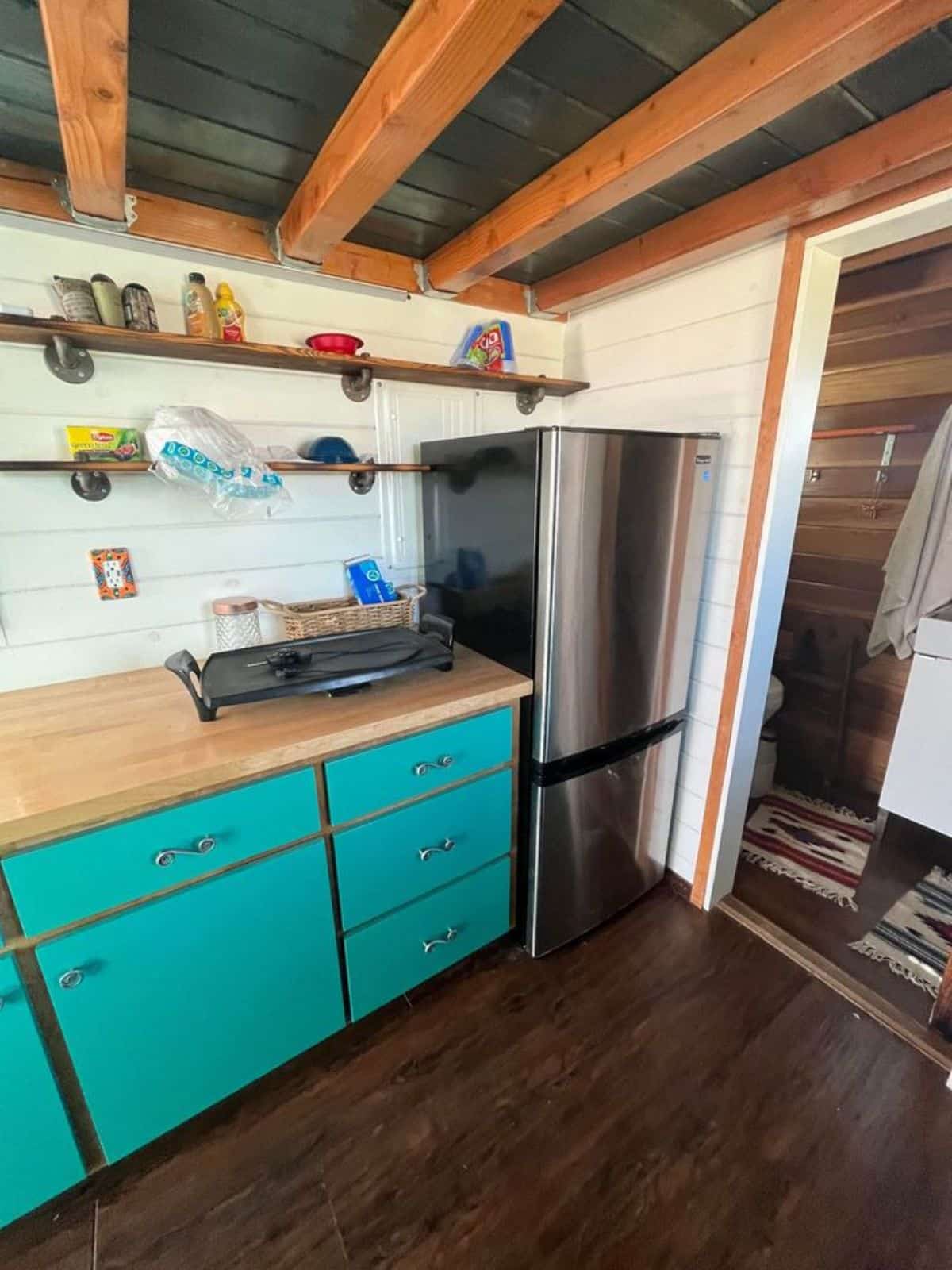 kitchen countertop and double door refrigerator of custom mobile home