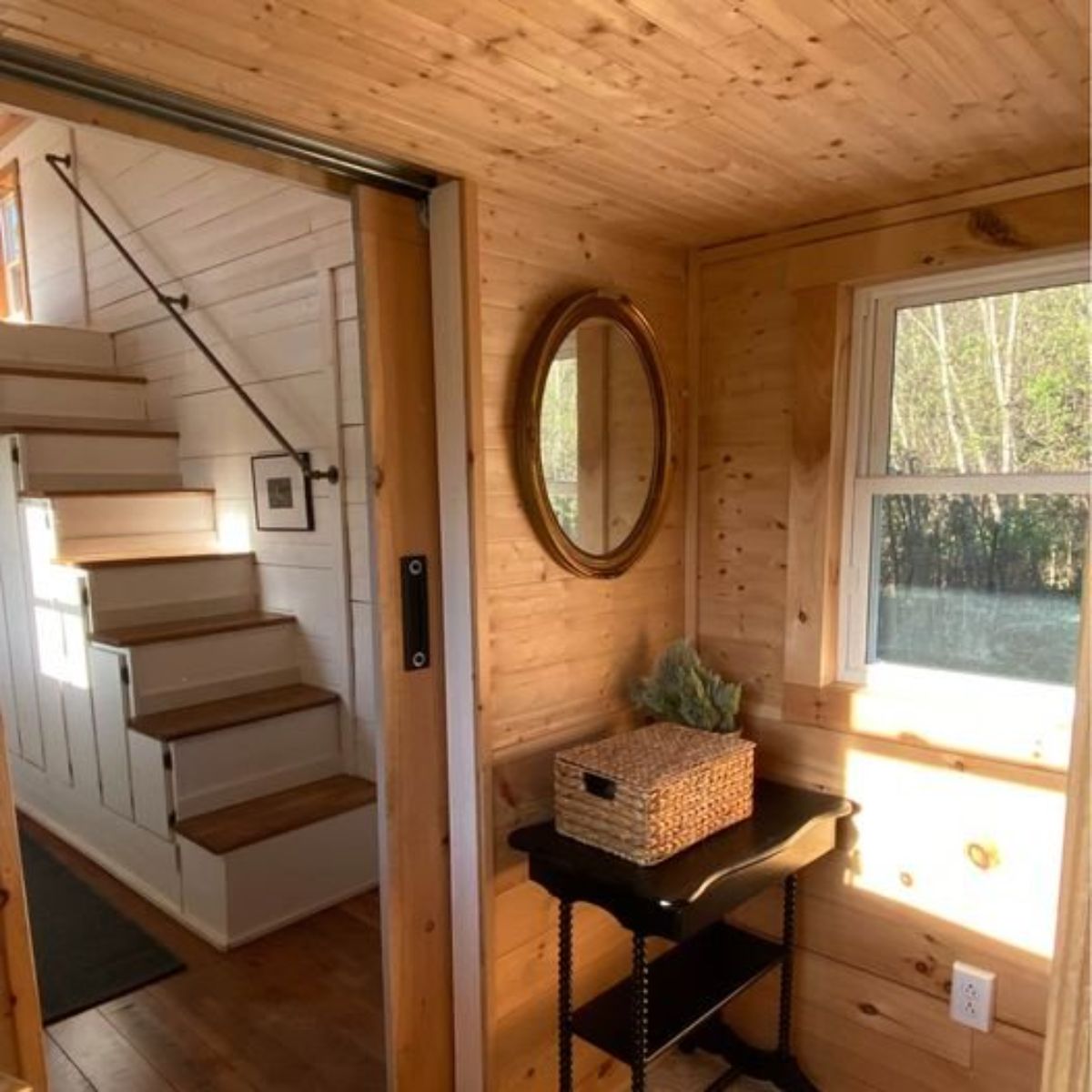 wooden walls of spacious 2 bedroom tiny home
