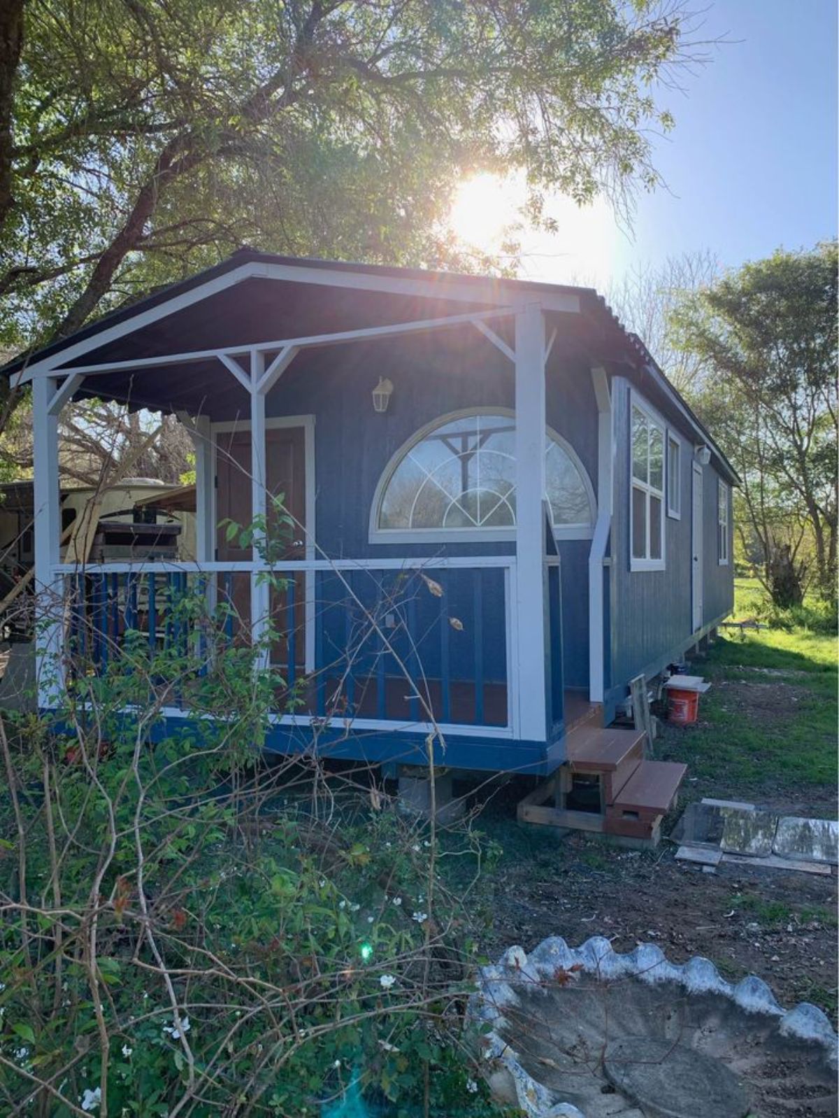 blue exterior of stunning 2 bedroom tiny home