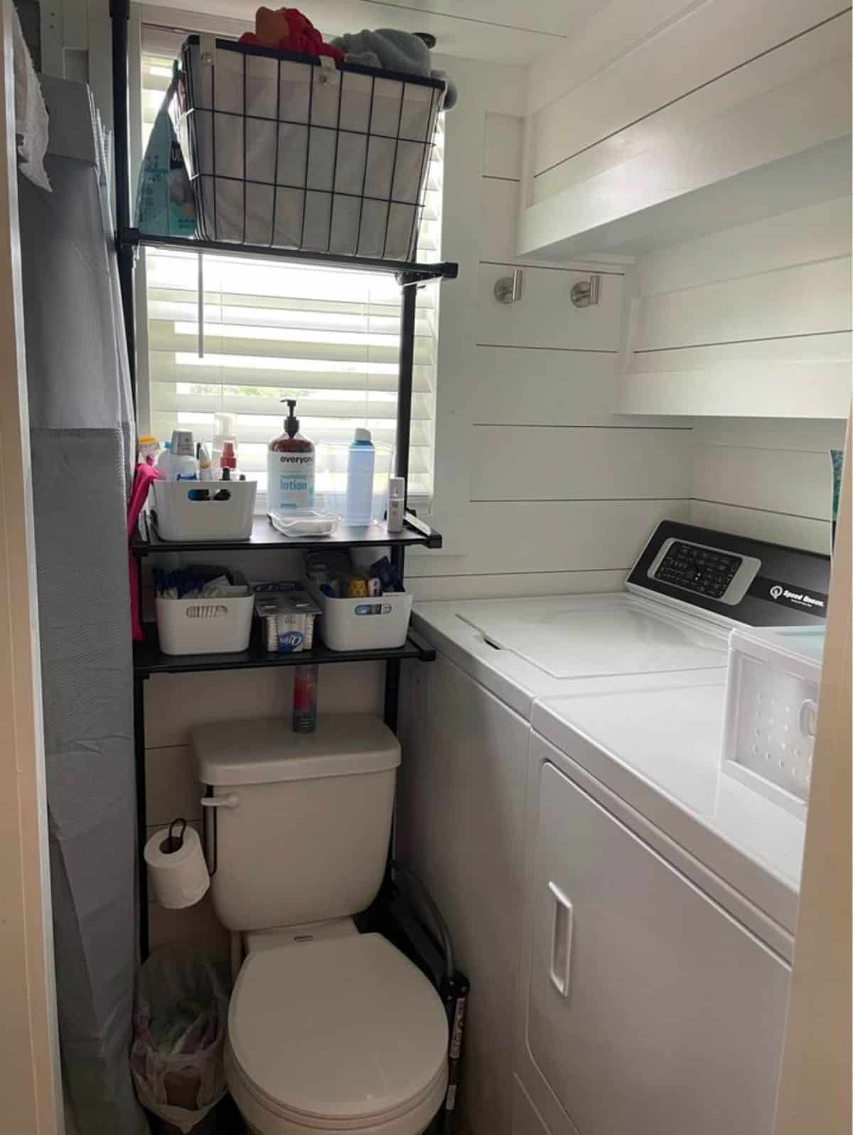 bathroom of tiny home for four  has all the standard fittings