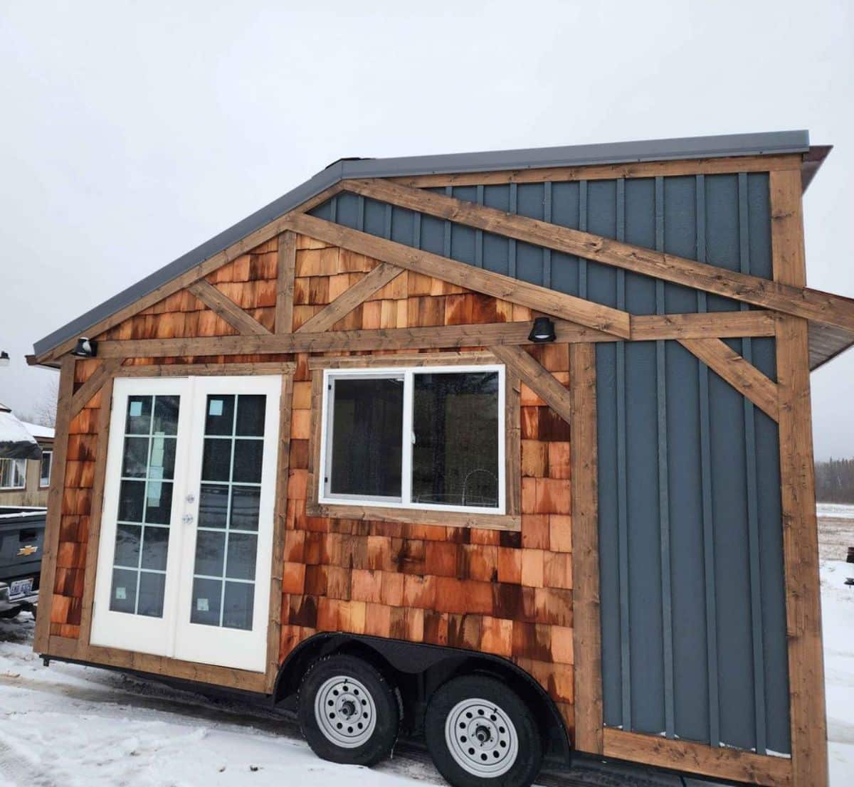 stunning tiny towable home under snow