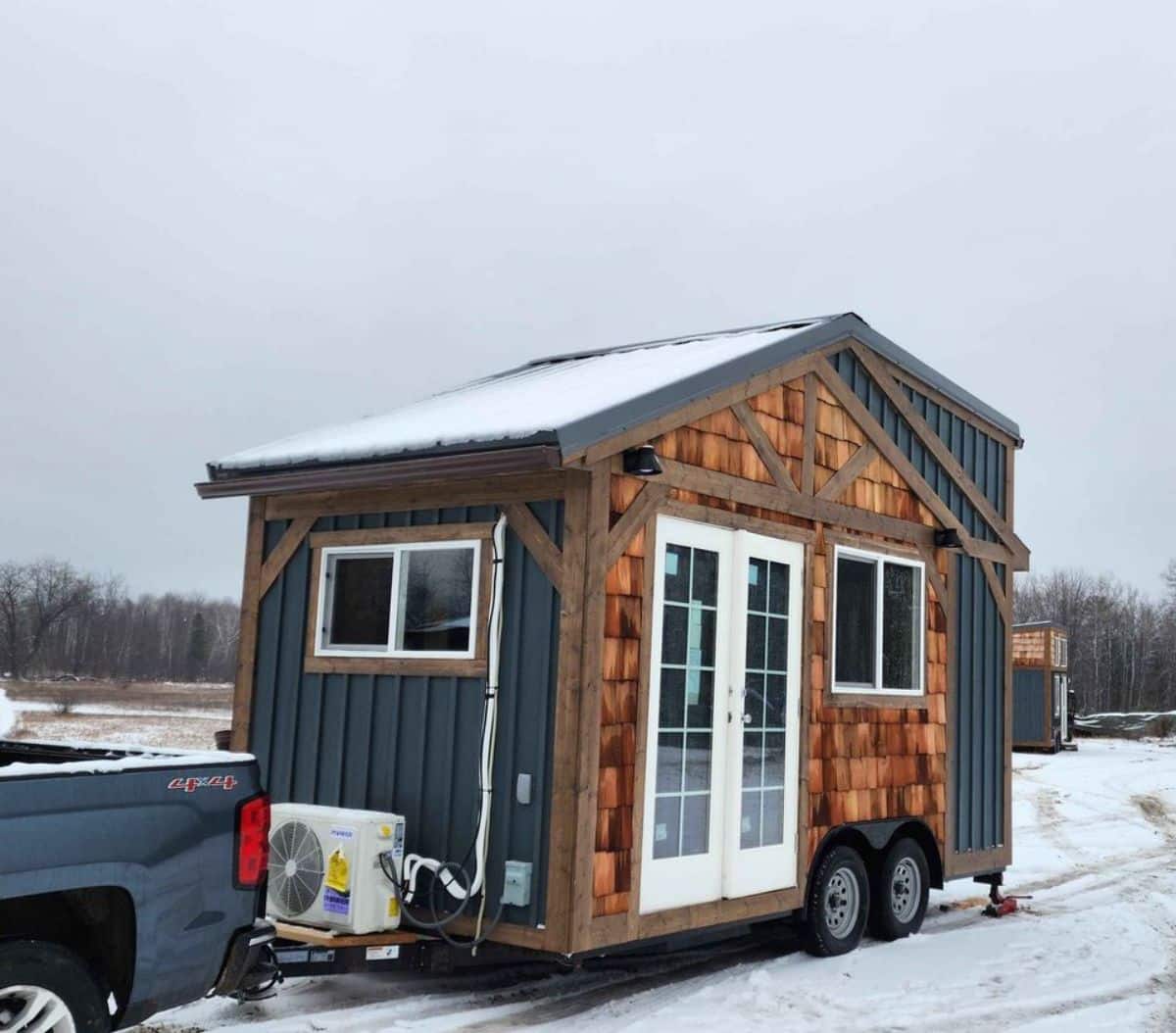 tiny towable home hooked up with the car