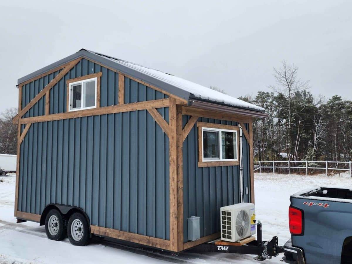 blue exterior on the backside of tiny towable home