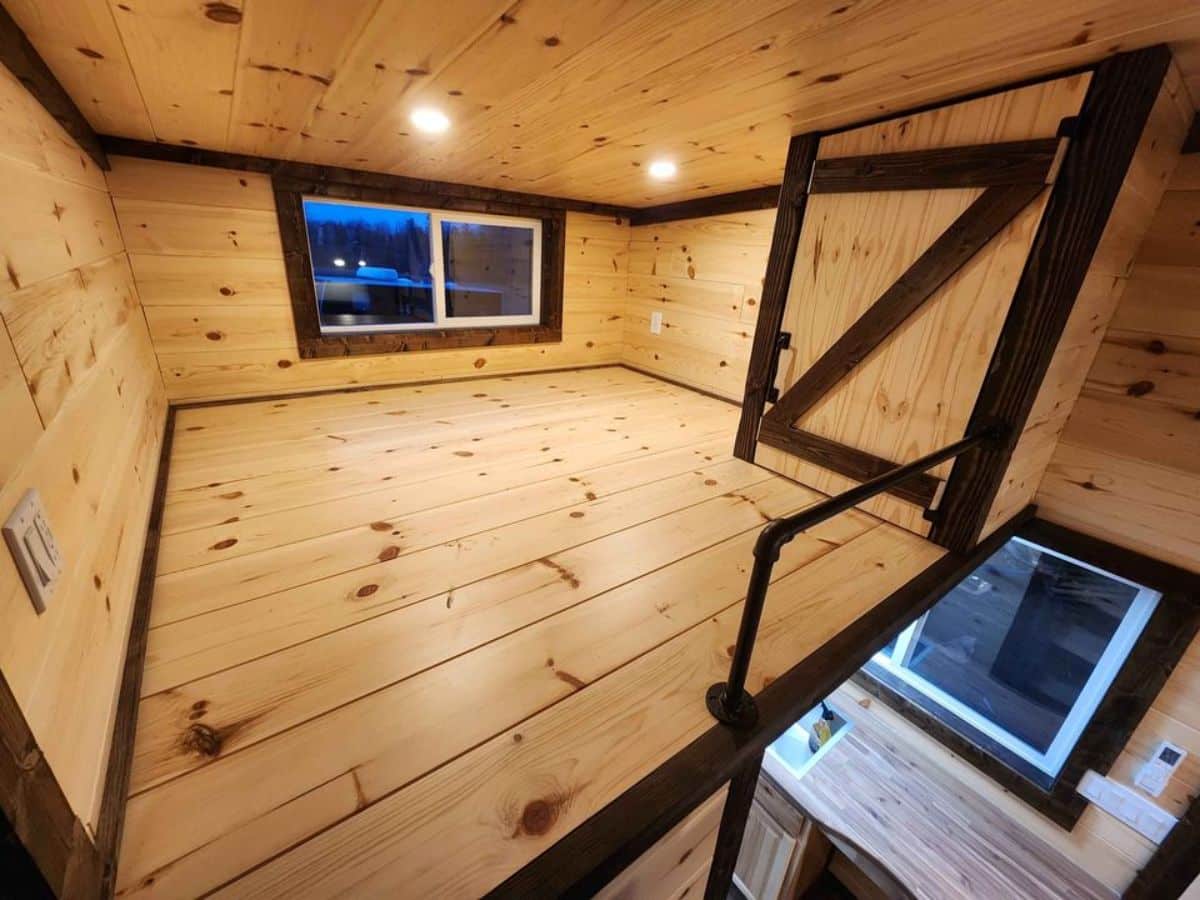 queen mattress can be put on the loft of tiny towable home