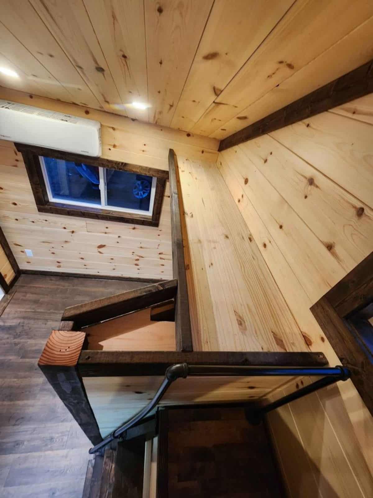 loft above the living room can fit for storage