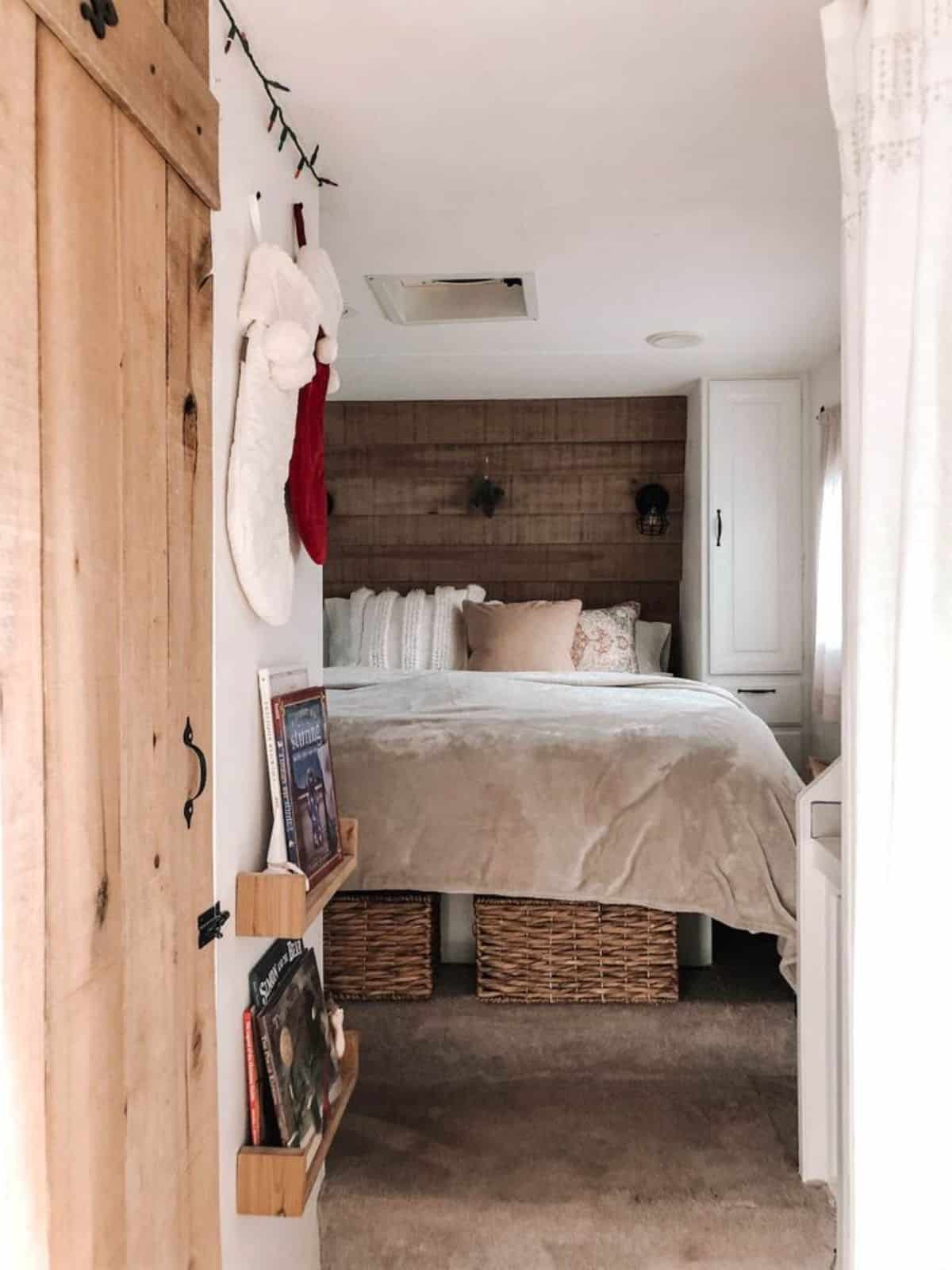 door towards the bedroom of tiny trailer house