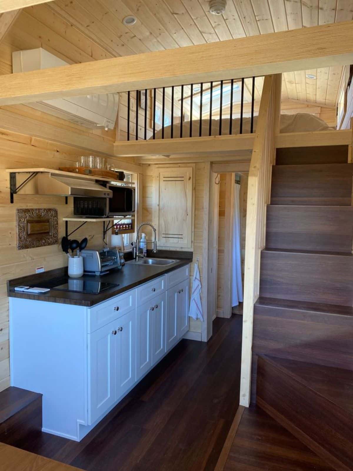 stairs leading to the loft bedroom of Tumbleweed tiny house
