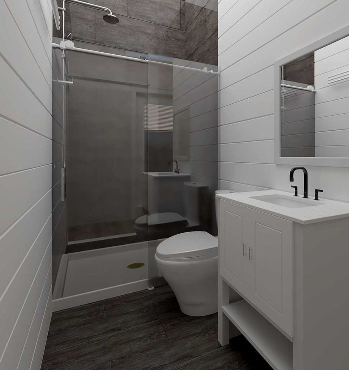 bathroom of tiny house has standard fittings with separate shower area and glass enclosure