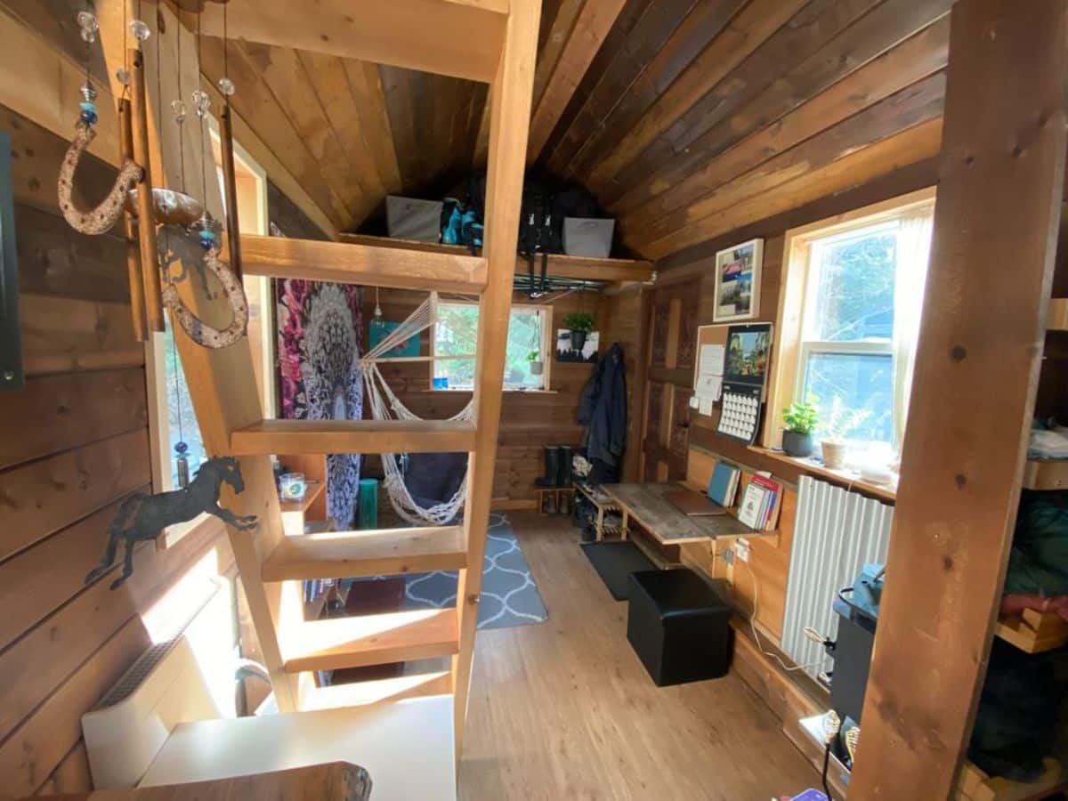 full length view of 20’ cozy tiny home from inside