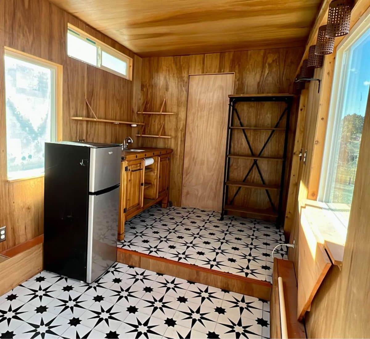 full length view of insulated tiny home from living area view