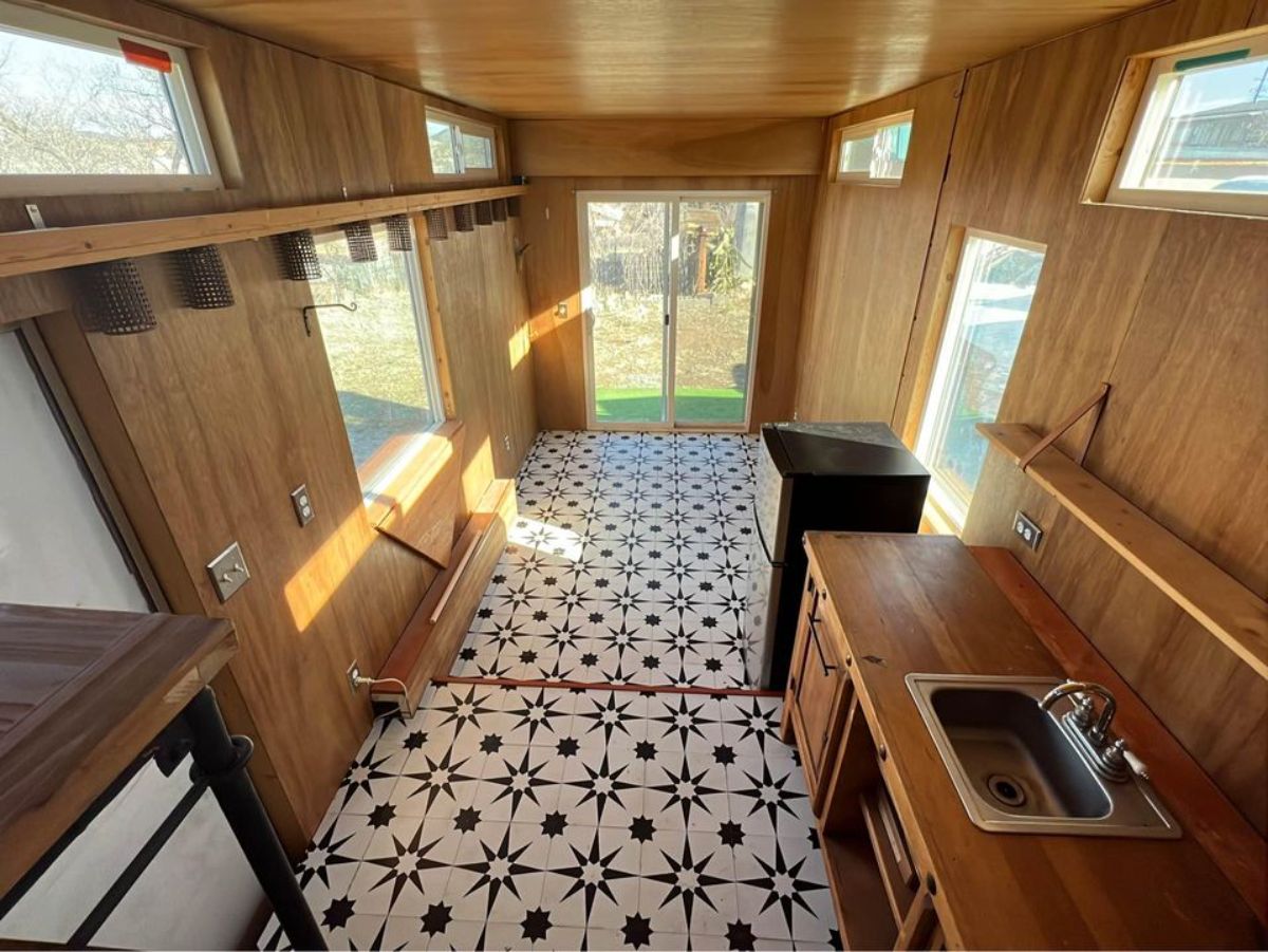 stunning interiors with multiple windows of insulated tiny home