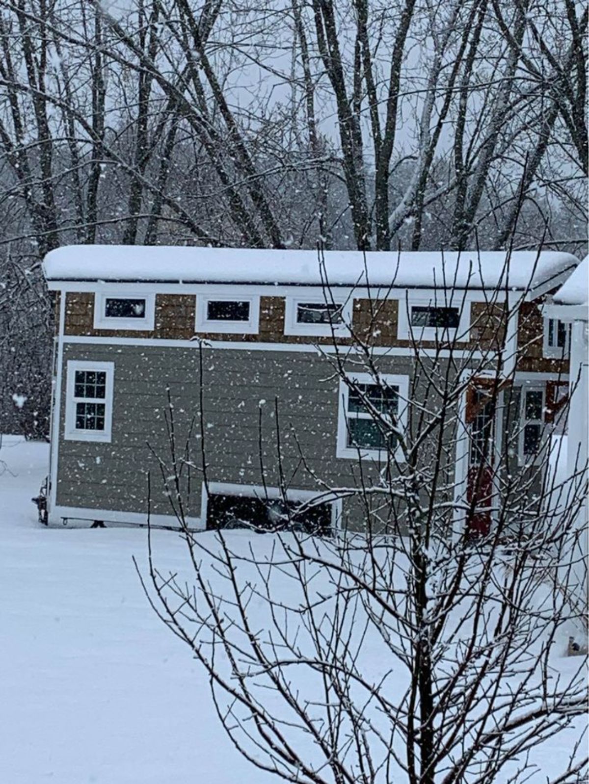 24' two bed tiny house under snow