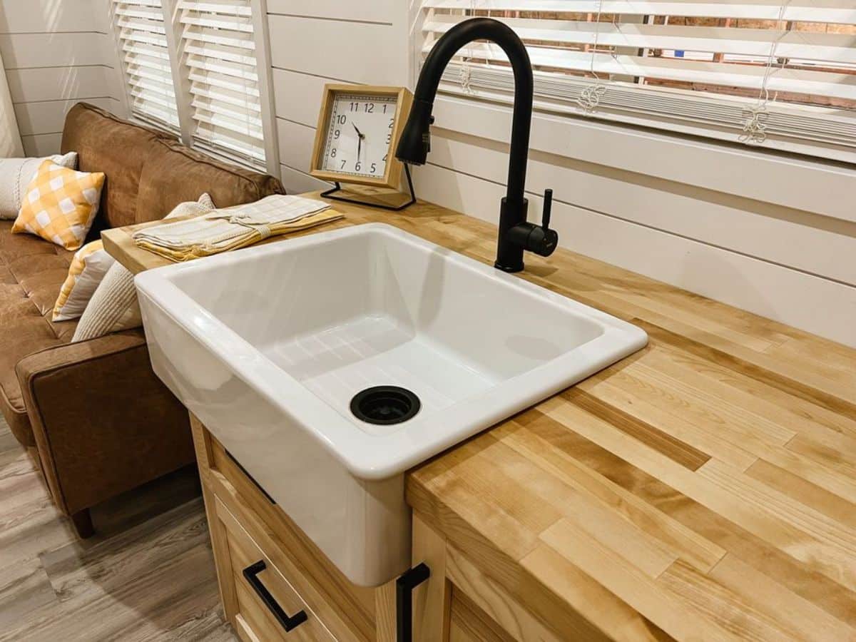 farmhouse sink in kitchen area of the house