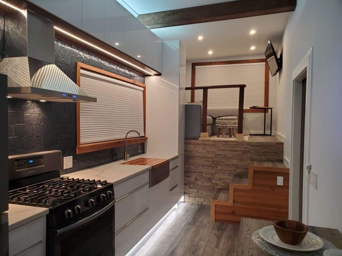 kitchen view of 30’ luxury tiny house on wheels