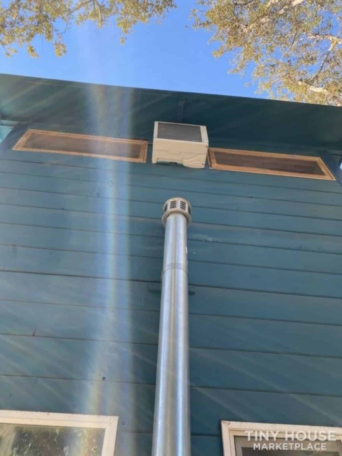 backside of 32' tiny offgrid house