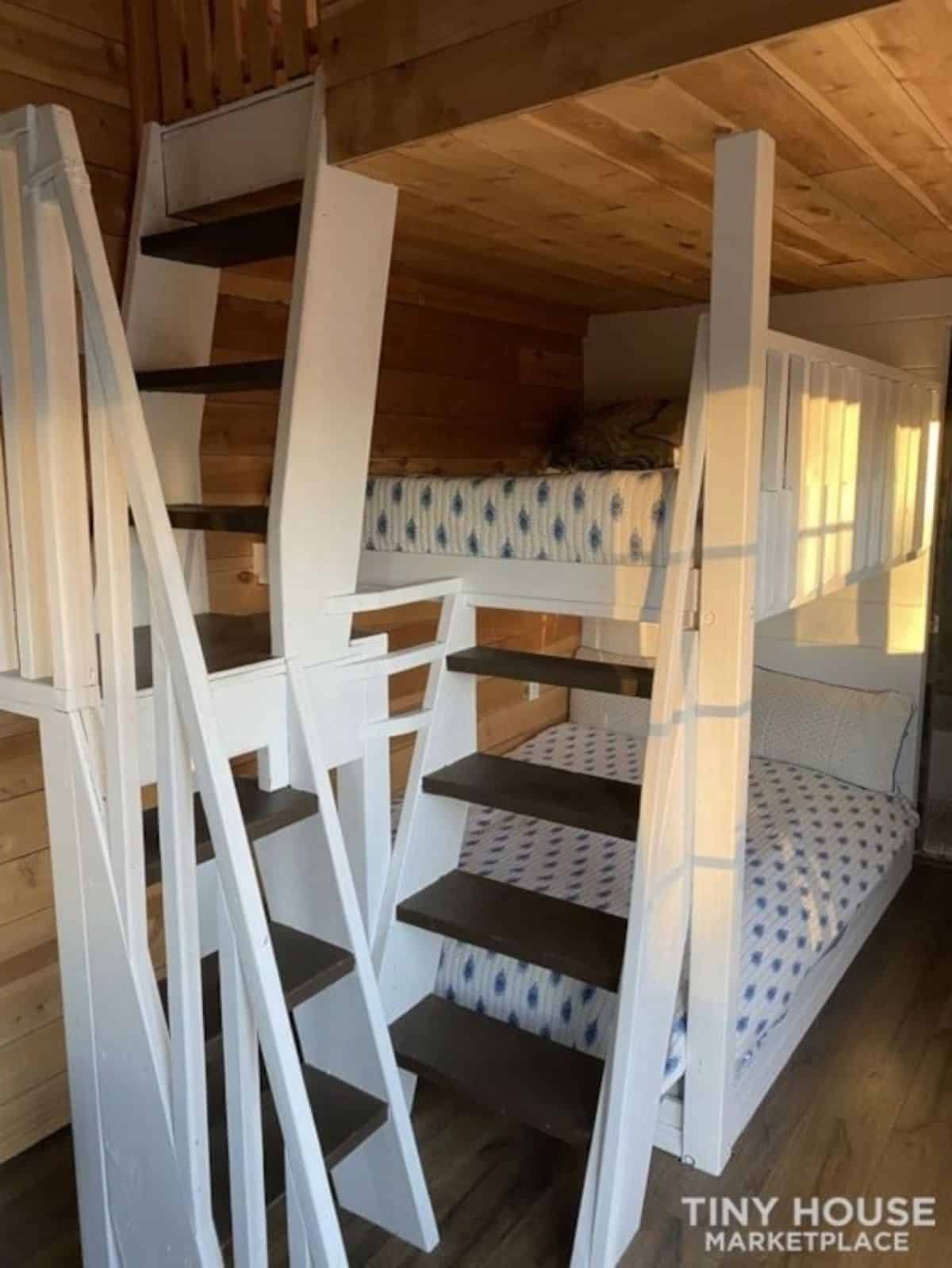 stairs leading to the loft bedroom of 32' tiny offgrid house