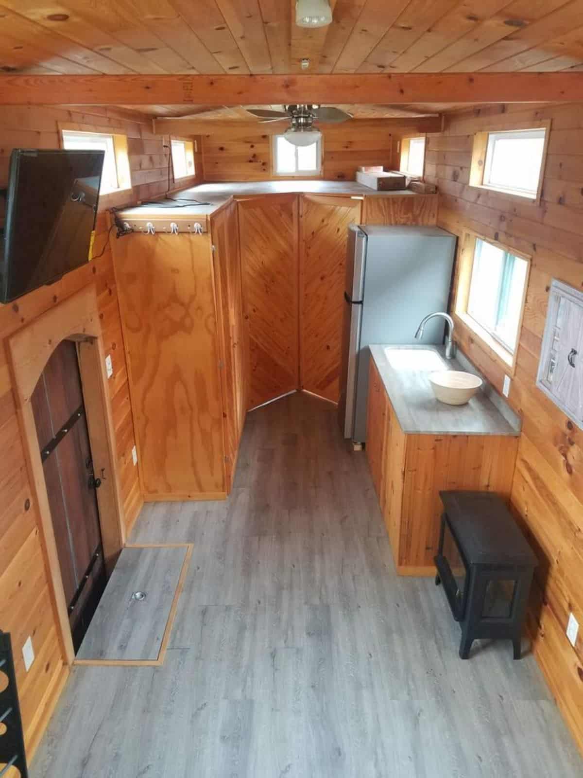 L shaped loft above the bathroom of rustic motorhome is stunning