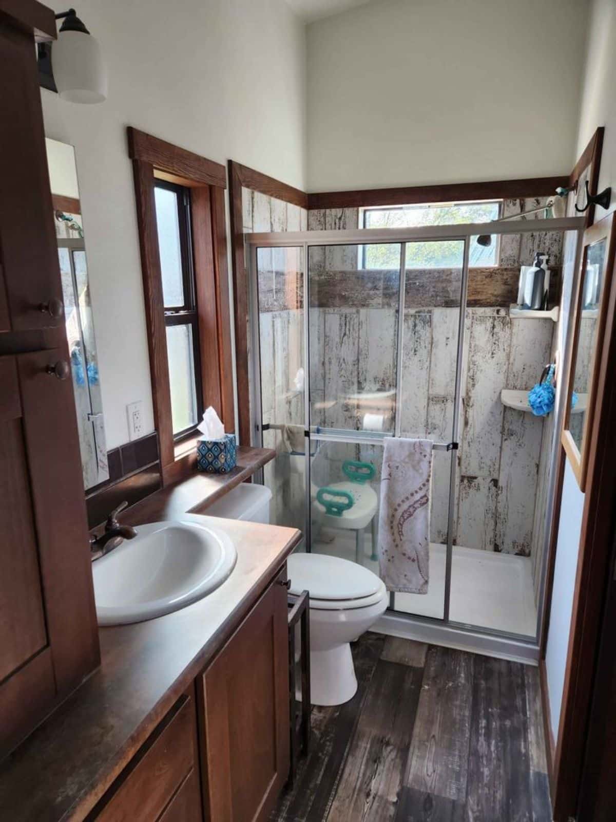 bathroom of cottage tiny home has all the standard fittings