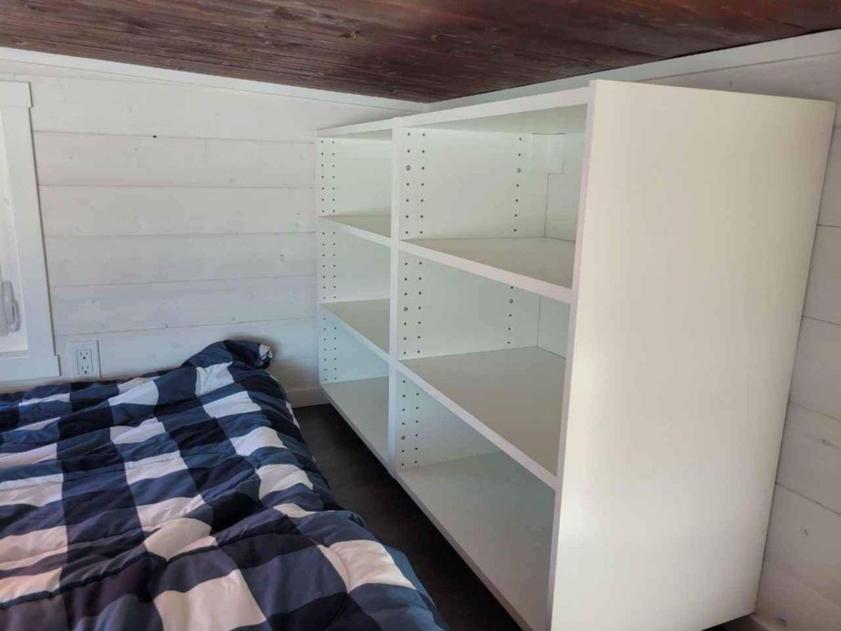 loft bedroom is spacious with storage cabinets