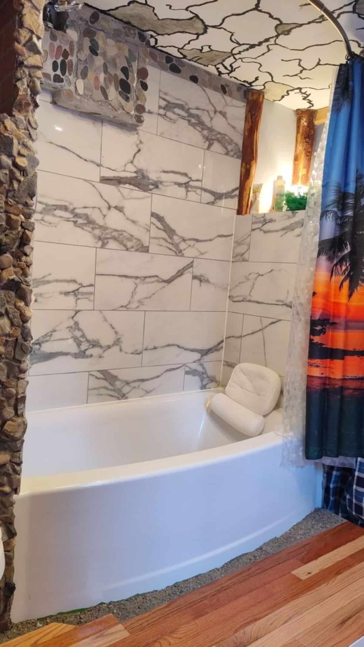 huge bathtub in bathroom of insulated container home