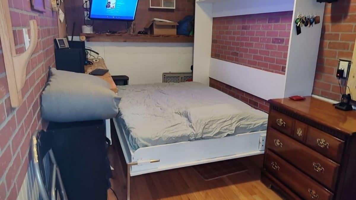 stunning murphy bed with furniture in bedroom of insulated container home