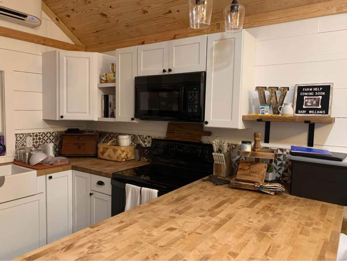 huge countertop in the kitchen area of 40' spacious tiny house