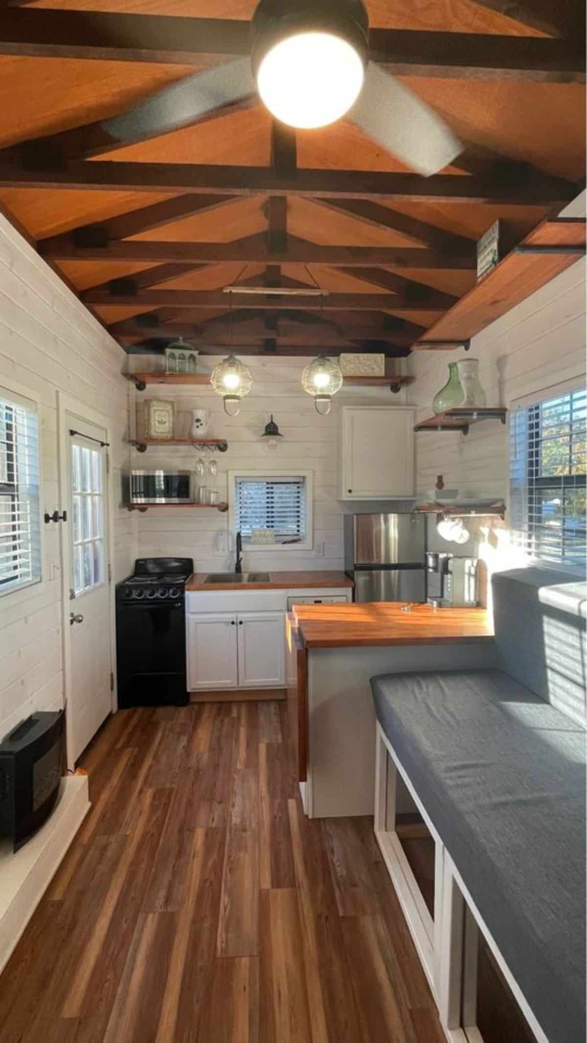 U shaped kitchen area of tiny home for four