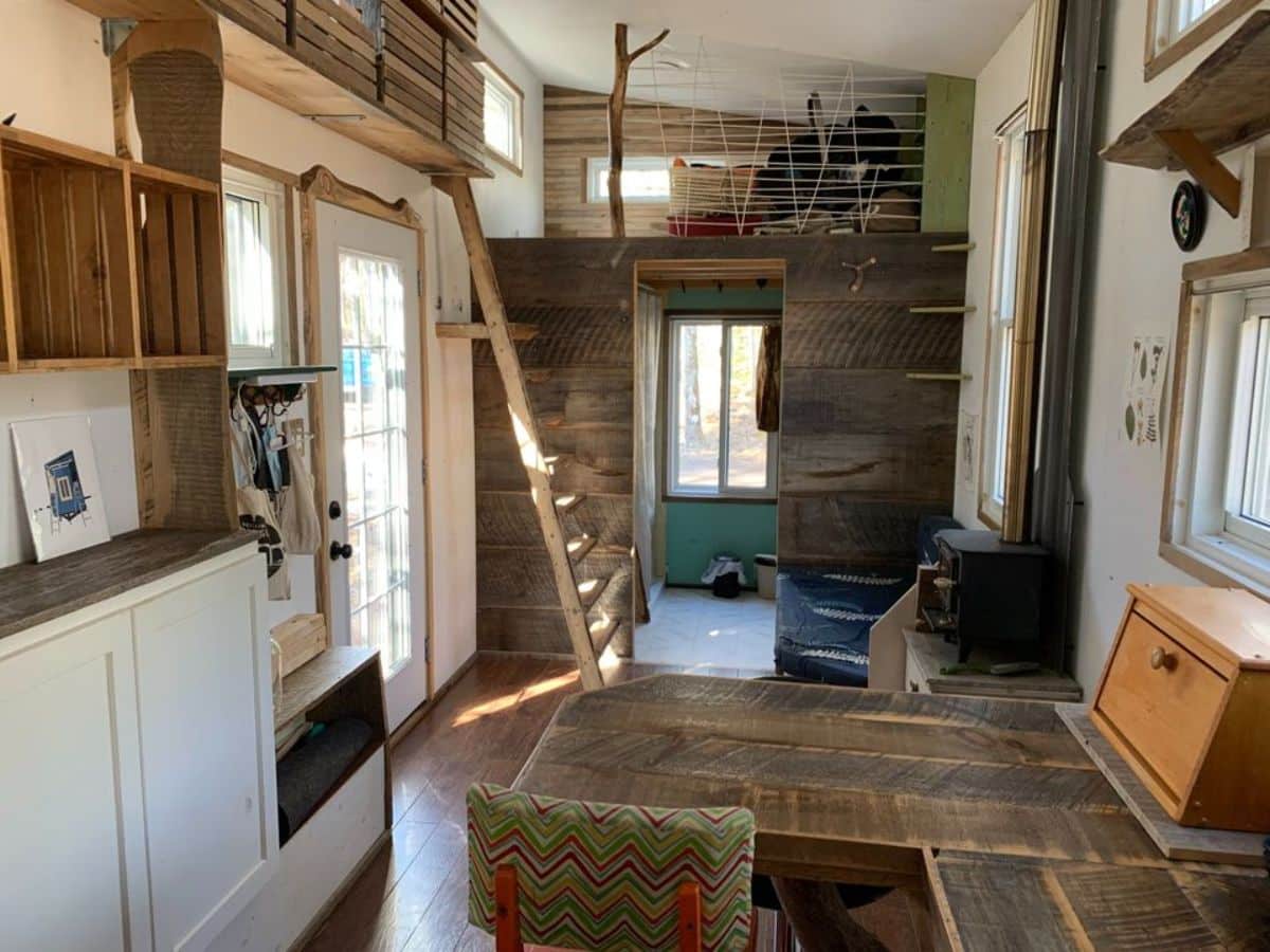 full length view of rustic 28’ tiny home from inside