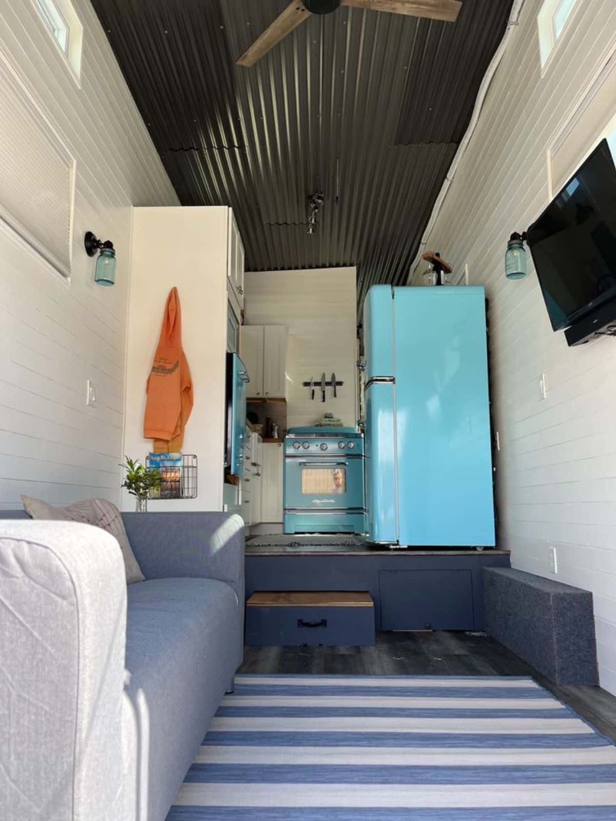 full length view of 35’ tiny home from living room view
