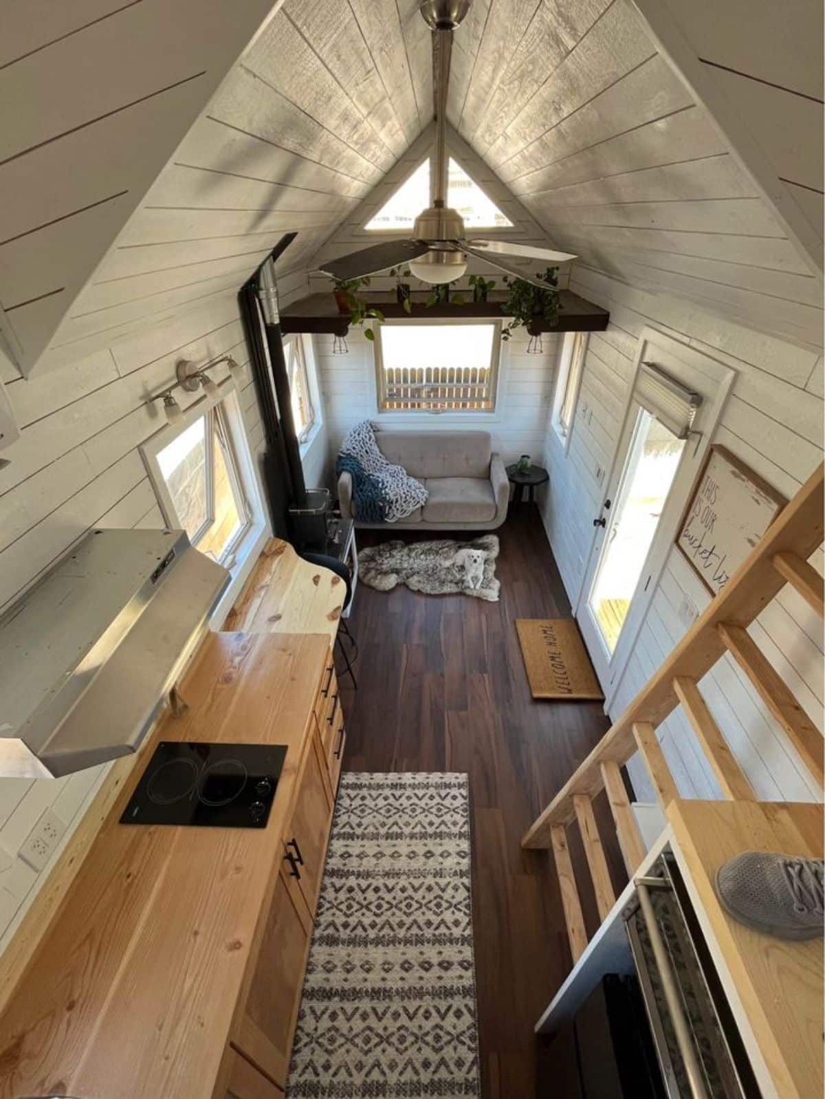 loft is above the bathroom and is accessible through ladder
