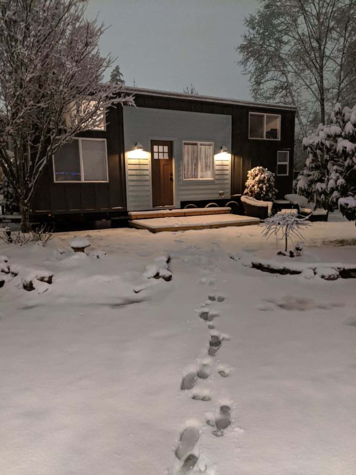 three bedroom tiny house under snow