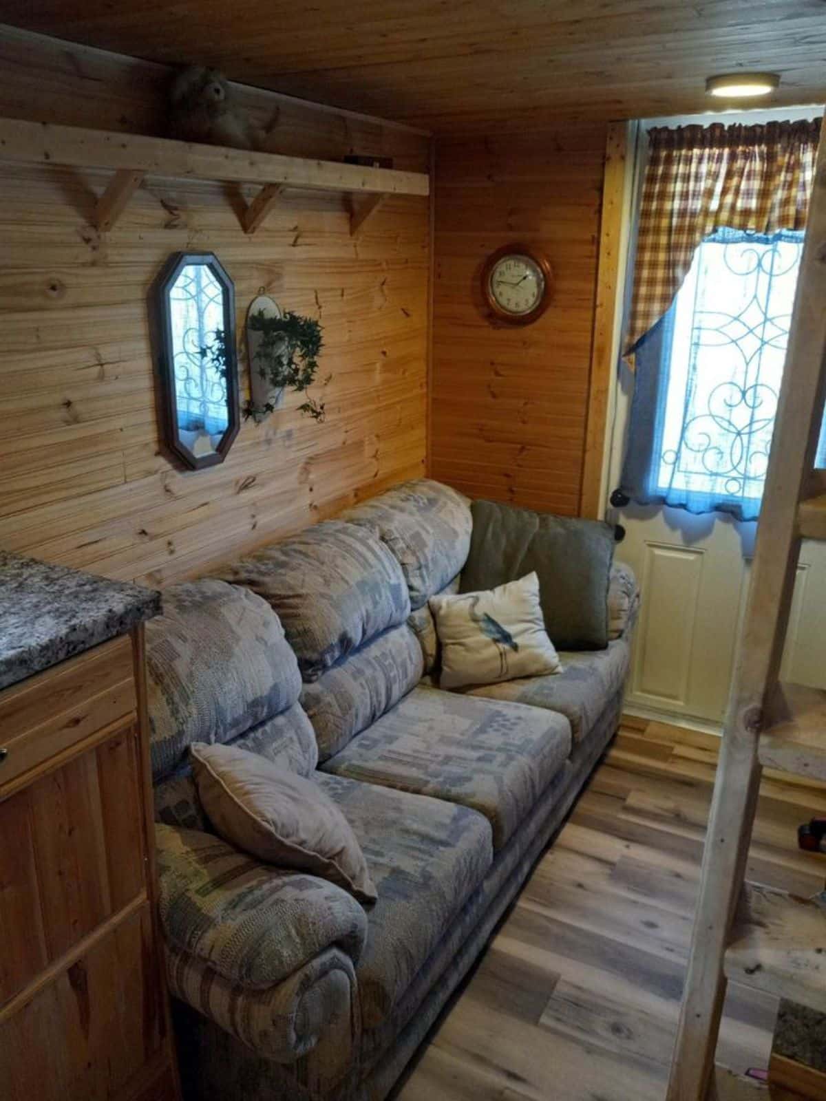comfortable couch in living area of tiny house in Florida