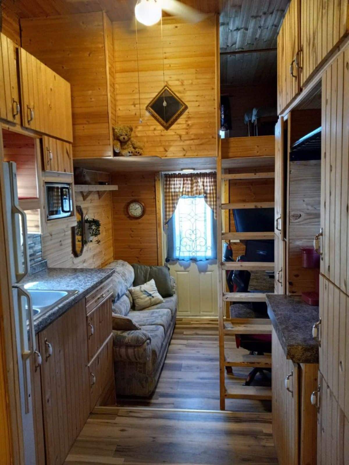 full length wooden interiors of tiny house in Florida